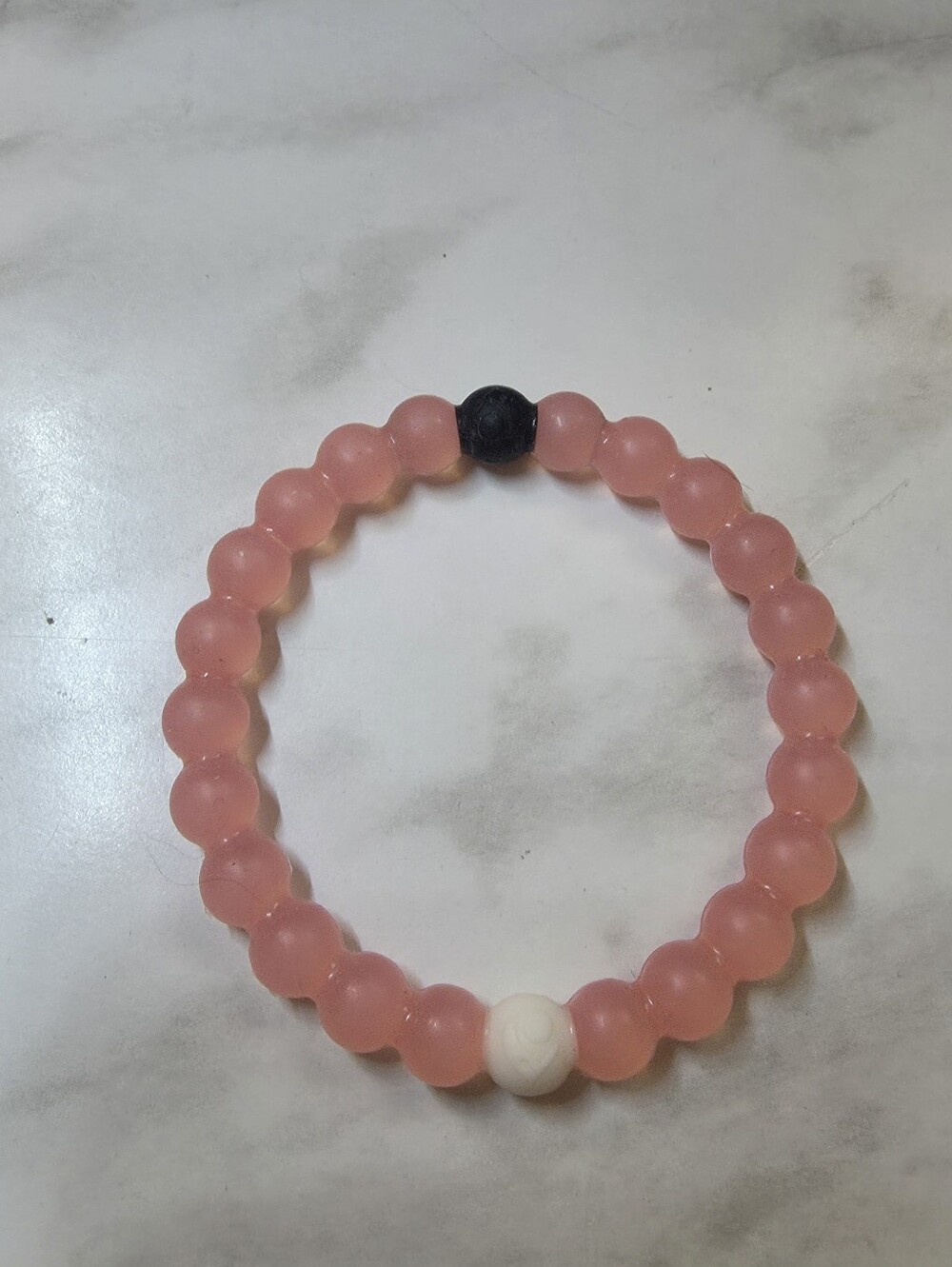 Pink Lokai bracelet